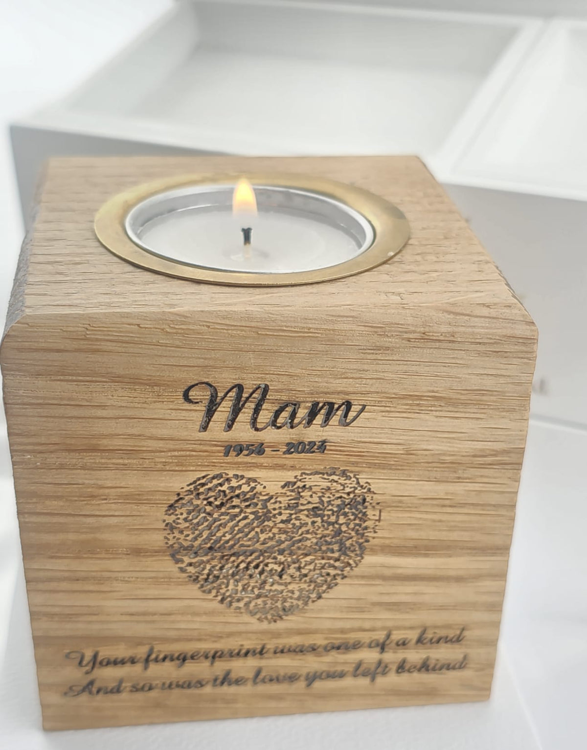 The 'Whispering light 'Oak Urn Keepsake 