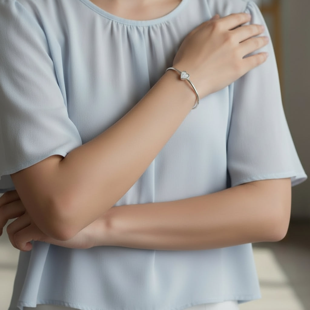 Amoura'  Sterling Silver Memorial Bangle.