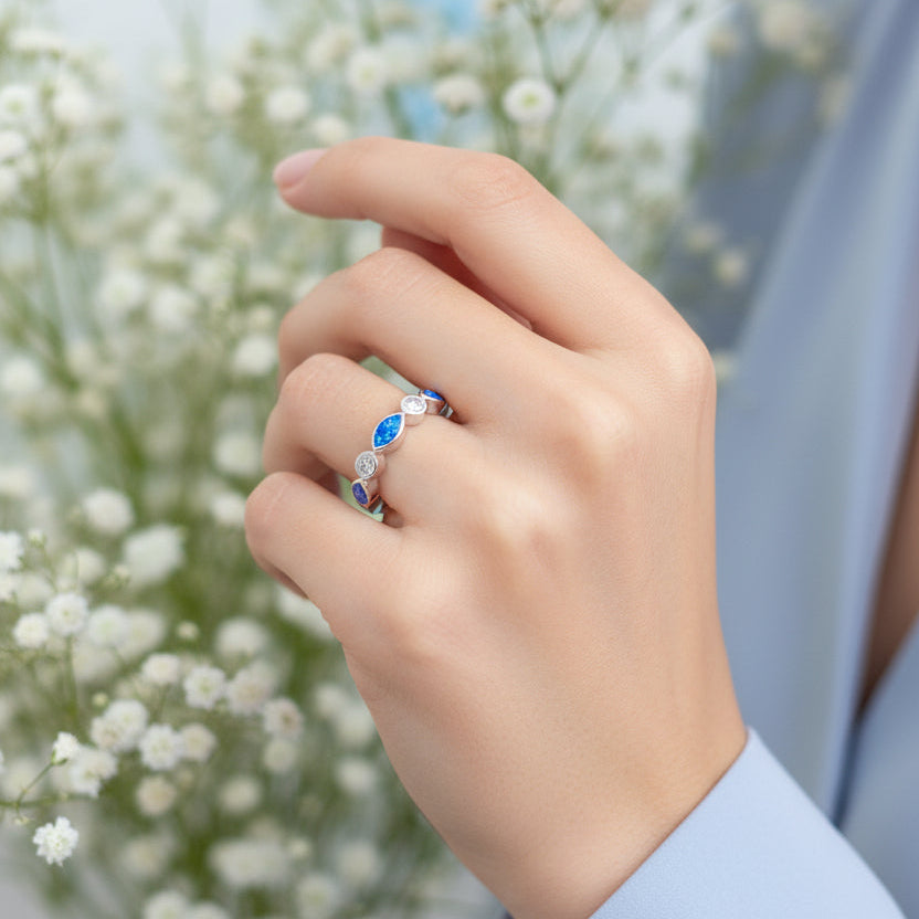 Silver ring with blue opal memorial stone