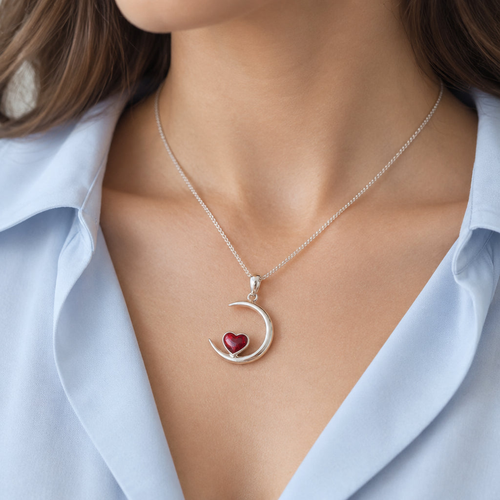 925 sterling silver memorial jewellery pendant with heart-shaped ashes inclusion and crescent moon design