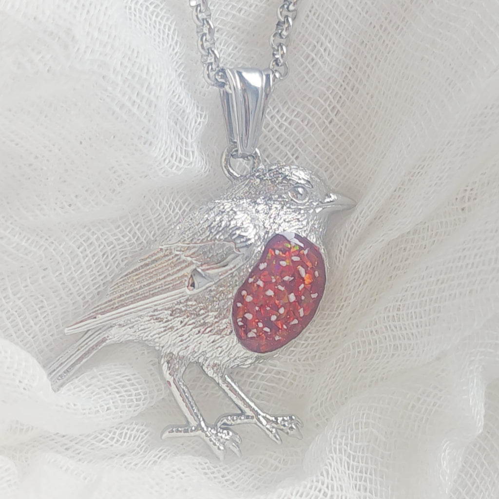 Robin pendant with a red opal memorial  stone