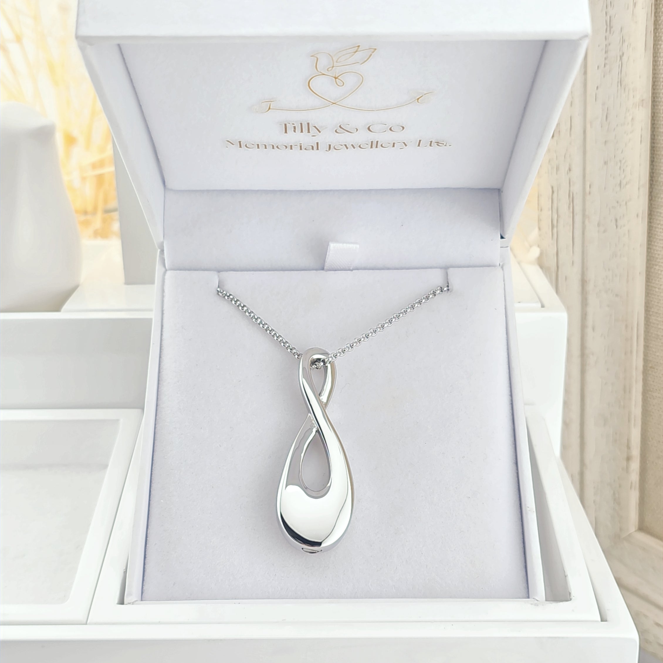 Serene Infinity  Stainless Steel Self Fill Pendant.