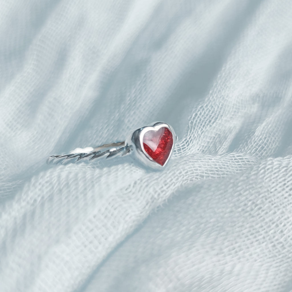 The Everly Heart Twist' Sterling Silver Memorial Ring.