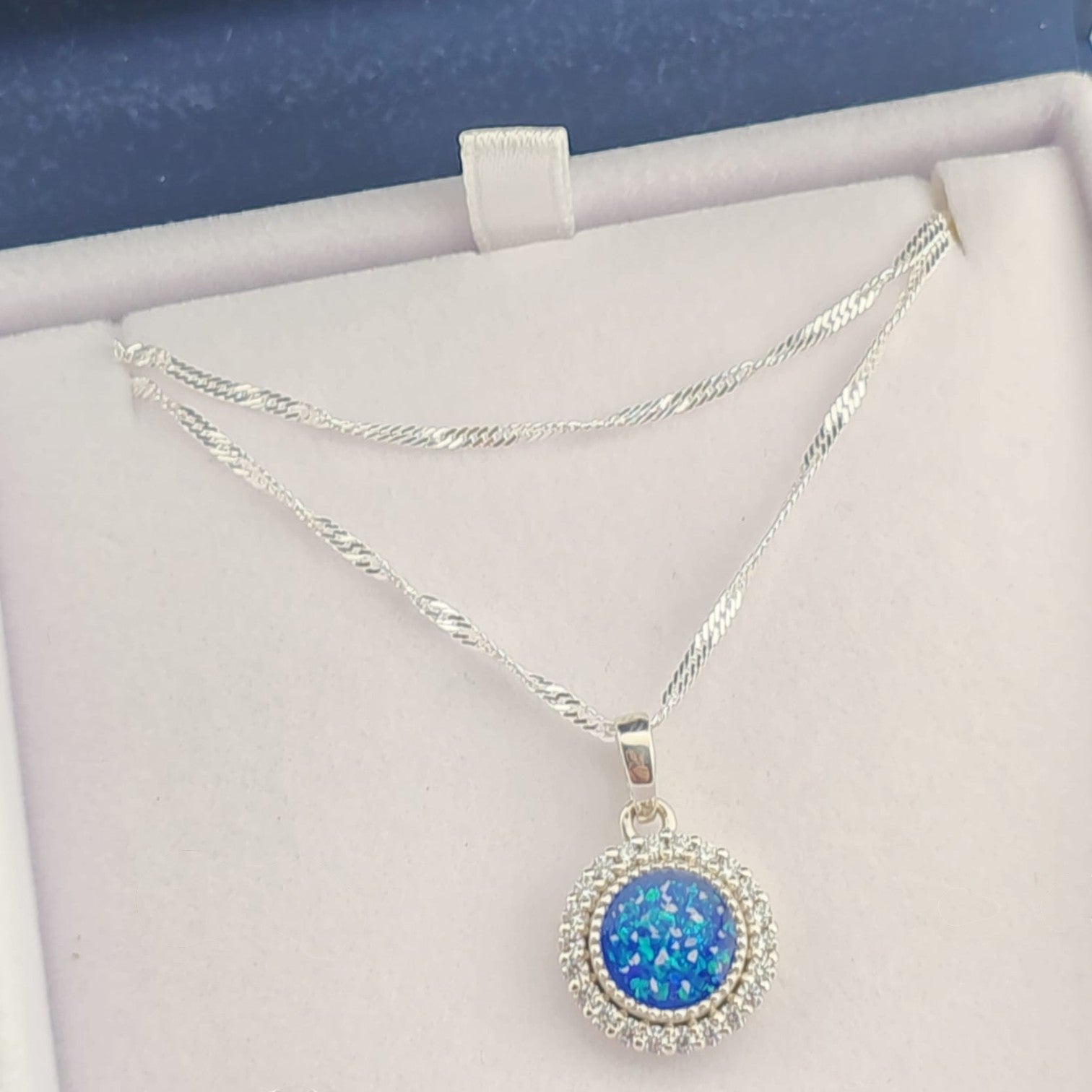 Tilly & Co Memorial Jewellery Ltd Celestia sterling silver crystal halo memorial pendant with blue resin keepsake