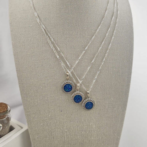 Tilly & Co Memorial Jewellery Ltd Celestia sterling silver crystal halo memorial pendants with blue resin settings